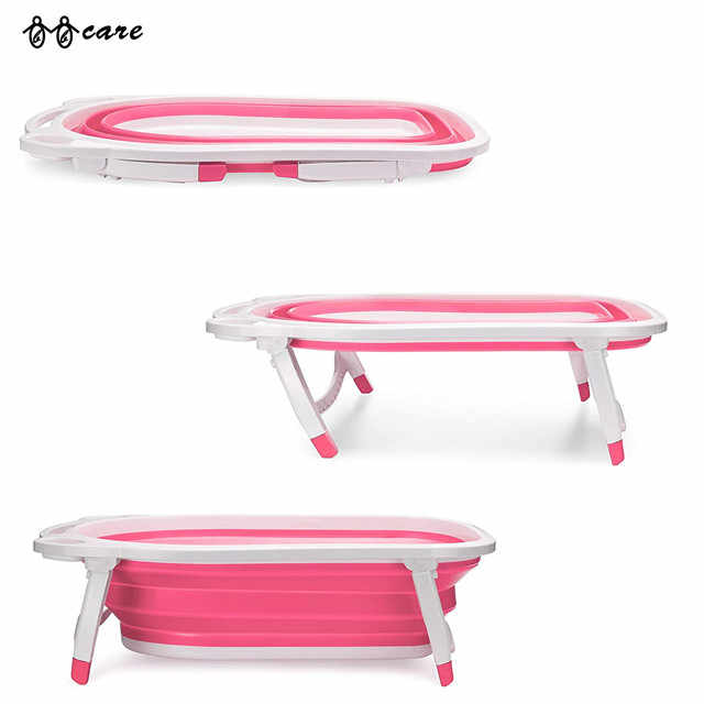 Set of three pink and white folding bathtubs on a white background