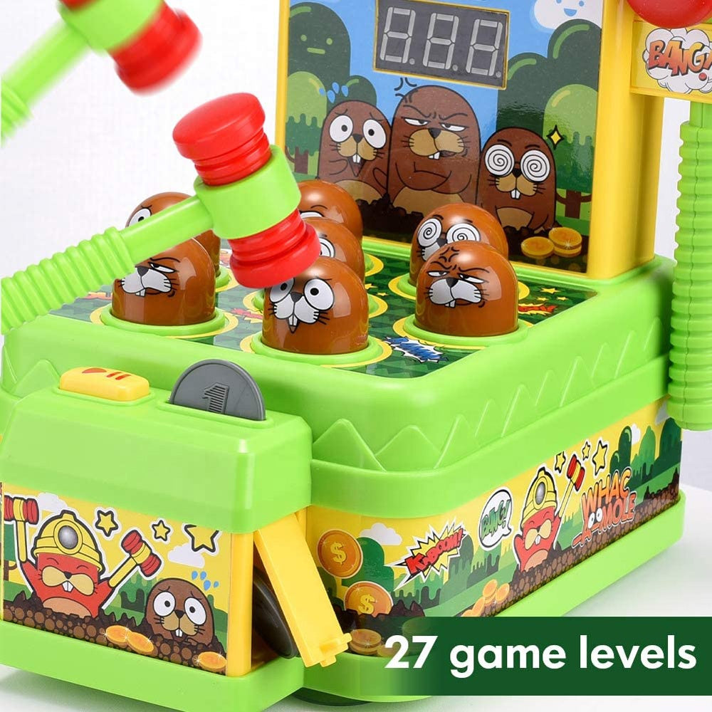 Children's toy with cartoon characters and game levels displayed, featuring a green base and colorful design.