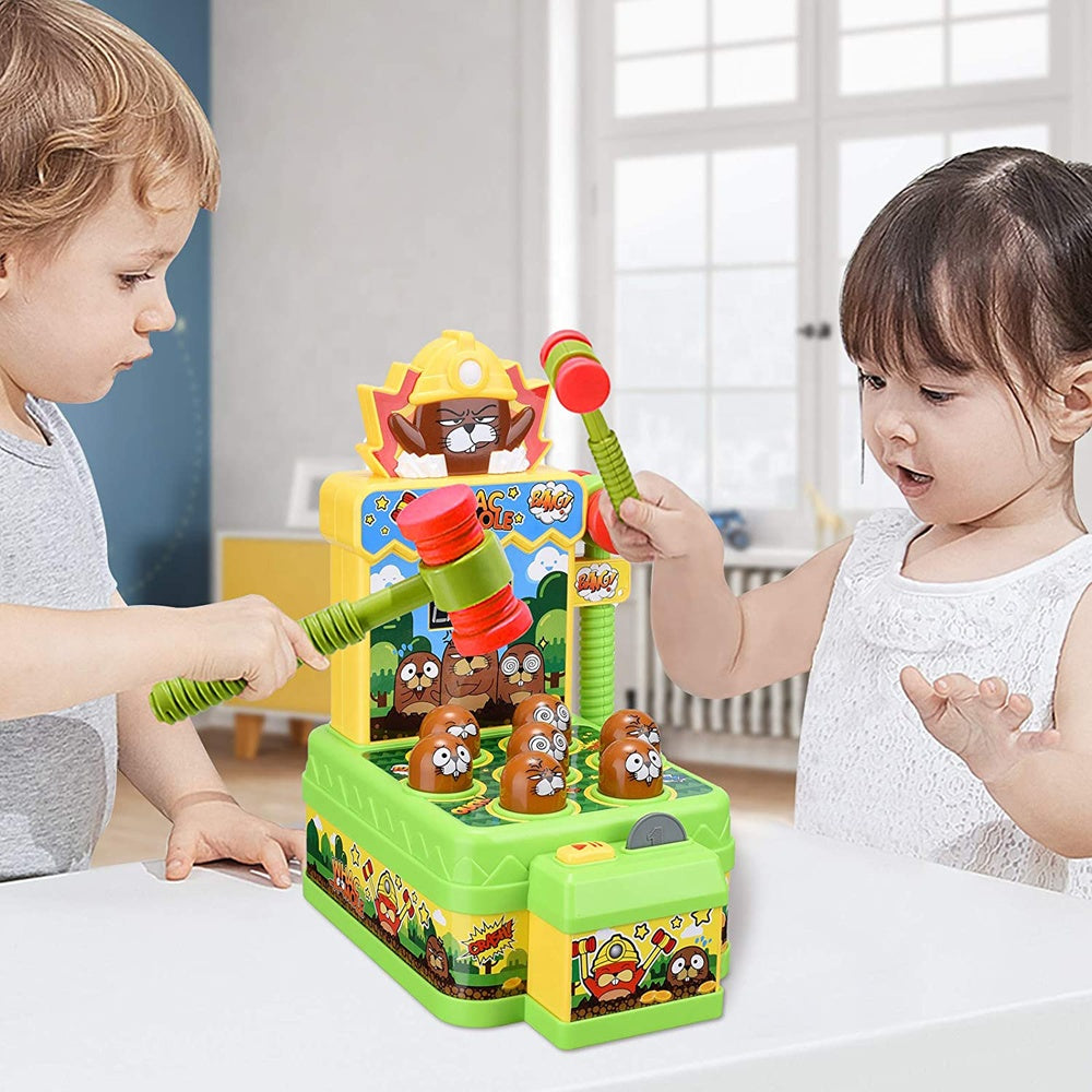 Two children playing with a colorful toy hammer and duck game.